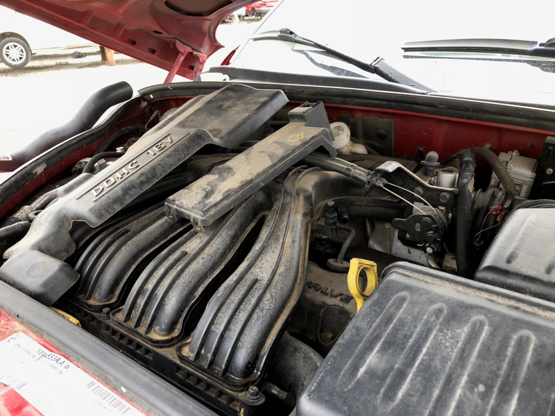 Illustration for article titled This Junkyard PT Cruiser Landaulet Proves Some Battles Can't Be Won
